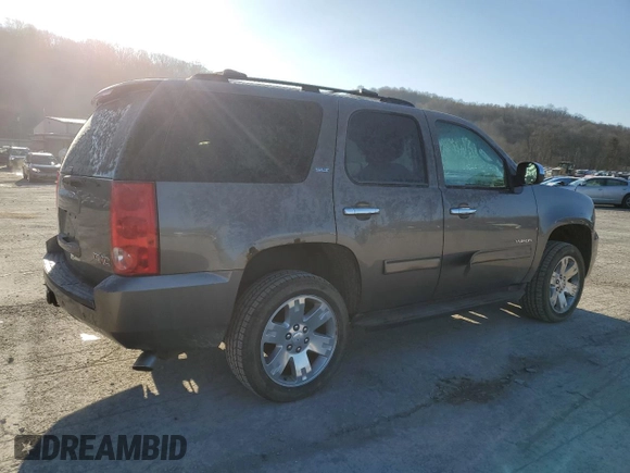 2012 GMC Yukon SLT with VIN 1GKS2CE05CR103674, listed as a Copart auction lot 50557275 with 206,664 mi miles and Salvage Title. Bid and sale history available at carsss.com. Image 3.
