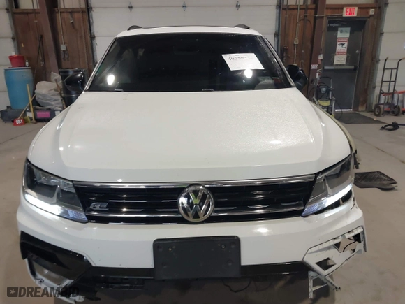 2020 Volkswagen Tiguan SE with VIN 3VV2B7AX1LM106600, listed as a IAAI auction lot 40259436 with 56,736 mi miles. Bid and sale history available at carsss.com. Image 12.