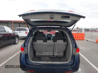 2014 Honda Odyssey EX-L with VIN 5FNRL5H68EB049914, listed as a IAAI auction lot 41986894 with 125,222 mi miles and . Bid and sale history available at carsss.com. Image 18.