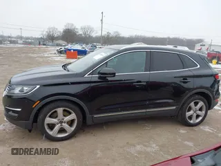 2017 Lincoln MKC Premiere with VIN 5LMCJ1D91HUL33023, listed as a IAAI auction lot 40976537 with 112,695 mi miles. Bid and sale history available at carsss.com. Image 14.