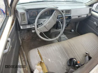 1986 Nissan Hardbody E z VIN JN6ND11S7GW014787, wystawiony jako Copart lot #45291425 z przebiegiem 171 557 mil mil oraz Szkody całkowita. Historia ofert i sprzedaży dostępna na DreamBid. Obrazek 8.