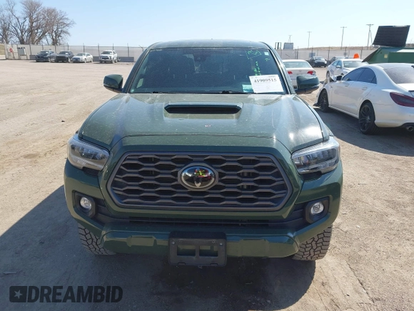 2022 Toyota Tacoma SR with VIN 3TMCZ5AN0NM470396, listed as a IAAI auction lot 41909515 with 35,997 mi miles and . Bid and sale history available at DreamBid. Image 13.