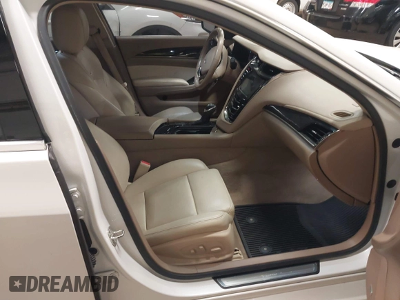 2016 Cadillac CTS Luxury Collection AWD with VIN 1G6AX5SS6G0125285, listed as a IAAI auction lot 42137355 with 110,299 mi miles and . Bid and sale history available at DreamBid. Image 5.
