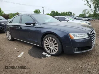 2015 Audi A8 4.0T with VIN WAUJ2AFD6FN011009, listed as a Copart auction lot 64173005 with 153,377 mi miles and Salvage title. Bid and sale history available at DreamBid. Image 4.