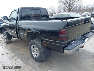 2001 Dodge Ram 1500 with VIN 1B7HF16Z31S144662, listed as a IAAI auction lot 41930146 with 104,146 mi miles. Bid and sale history available at carsss.com. Image 3.