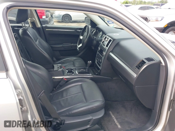 2010 Chrysler 300 Touring with VIN 2C3CA5CV1AH272993, listed as a IAAI auction lot 42154073 with 224,685 mi miles and . Bid and sale history available at DreamBid. Image 5.