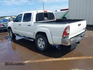 2014 Toyota Tacoma PreRunner with VIN 5TFJX4GN4EX032845, listed as a IAAI auction lot 41915723 with 163,978 mi miles and . Bid and sale history available at DreamBid. Image 3.
