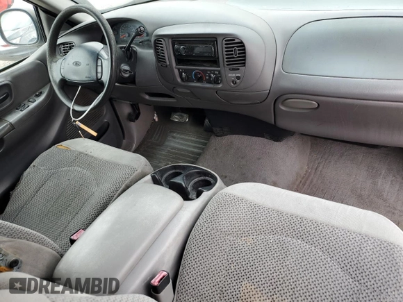 1999 Ford F-150 with VIN 2FTZX1729XCA64069, listed as a Copart auction lot 56246845 with Not provided miles and Salvage title. Bid and sale history available at DreamBid. Image 8.