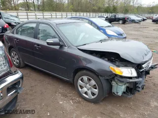 2010 Kia Optima LX with VIN KNAGG4A82A5394267, listed as a IAAI auction lot 41955386 with 134,912 mi miles. Bid and sale history available at carsss.com. Image 1.