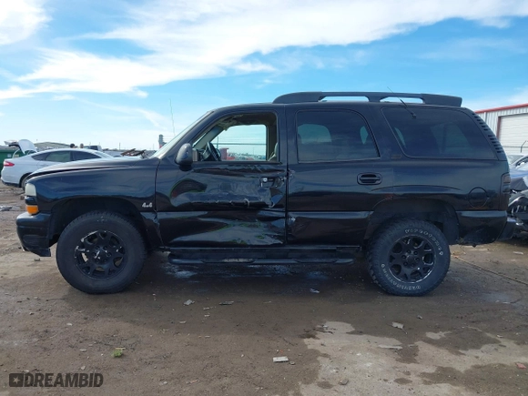 2001 Chevrolet Tahoe LS with VIN 1GNEK13T41R219642, listed as a IAAI auction lot 41655081 with 243,737 mi miles. Bid and sale history available at carsss.com. Image 14.