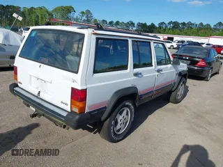 1994 Jeep Cherokee Sport with VIN 1J4FT68S7RL160652, listed as a IAAI auction lot 41992392 with 158,122 mi miles and . Bid and sale history available at DreamBid. Image 4.