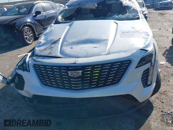 2022 Cadillac XT4 FWD Luxury with VIN 1GYAZAR48NF170949, listed as a IAAI auction lot 41857671 with 25,881 mi miles and . Bid and sale history available at carsss.com. Image 12.
