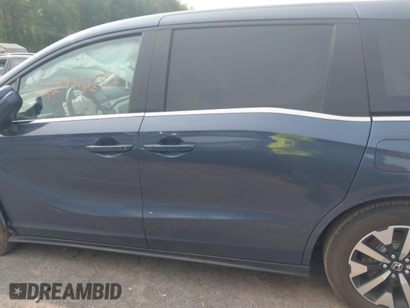 2025 Honda Odyssey EX-L z VIN 5FNRL6H68SB018745, wystawiony jako IAAI lot #42416672 z przebiegiem 6 019 mil mil oraz . Historia ofert i sprzedaży dostępna na DreamBid. Obrazek 15.