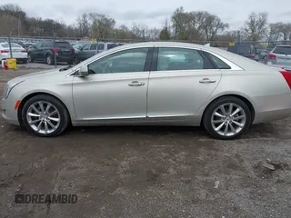 2013 Cadillac XTS Luxury z VIN 2G61R5S30D9174924, wystawiony jako IAAI lot #41958461 z przebiegiem 78 673 mil mil oraz . Historia ofert i sprzedaży dostępna na DreamBid. Obrazek 14.