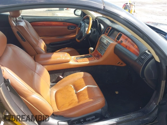 2003 Lexus SC 430 z VIN JTHFN48Y530041126, wystawiony jako IAAI lot #41794578 z przebiegiem 143 391 mil mil oraz . Historia ofert i sprzedaży dostępna na DreamBid. Obrazek 5.