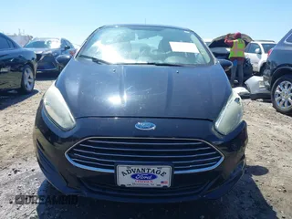 2016 Ford Fiesta SE with VIN 3FADP4BJ9GM144119, listed as a IAAI auction lot 41882179 with 122,048 mi miles. Bid and sale history available at carsss.com. Image 12.