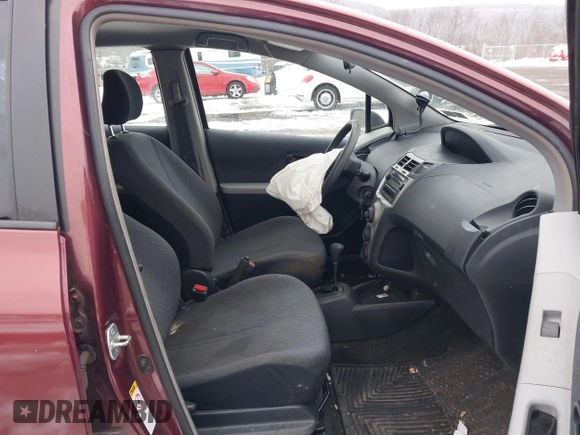 2010 Toyota Yaris with VIN JTDKT4K34A5291847, listed as a IAAI auction lot 41562243 with 182,067 mi miles. Bid and sale history available at carsss.com. Image 5.