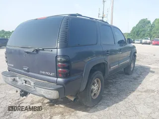 2002 Chevrolet Tahoe LS z VIN 1GNEC13ZX2R273935, wystawiony jako IAAI lot #42246472 z przebiegiem 205 995 mil mil oraz . Historia ofert i sprzedaży dostępna na DreamBid. Obrazek 4.