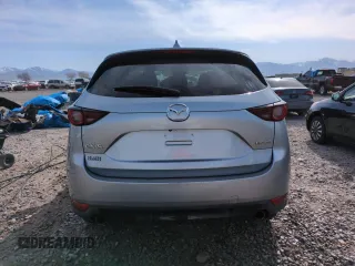2020 Mazda CX-5 Touring with VIN JM3KFBCMXL0767254, listed as a Copart auction lot 52189335 with 96,922 mi miles and Salvage Title. Bid and sale history available at carsss.com. Image 6.