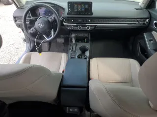 2024 Honda Civic Touring z VIN 2HGFE1F98RH336464, wystawiony jako Copart lot #50504775 z przebiegiem 14 655 mil mil oraz Szkoda całkowita • Salvage title. Historia ofert i sprzedaży dostępna na DreamBid. Obrazek 8.
