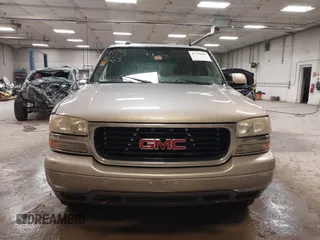2004 GMC Yukon SLT with VIN 1GKEK13TX4J155865, listed as a IAAI auction lot 41758663 with 281,531 mi miles. Bid and sale history available at carsss.com. Image 12.