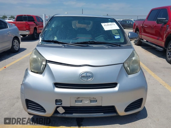 2012 Scion iQ with VIN JTNJJXB07CJ018562, listed as a IAAI auction lot 42404672 with 79,867 mi miles and . Bid and sale history available at DreamBid. Image 13.