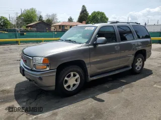 2005 GMC Yukon Denali z VIN 1GKEK63U45J164908, wystawiony jako Copart lot #59240355 z przebiegiem 266 455 mil mil oraz Czysty tytuł • Clean title. Historia ofert i sprzedaży dostępna na DreamBid. Obrazek 1.