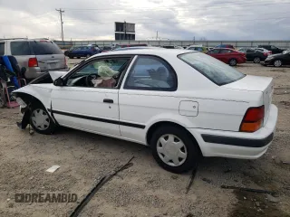 1995 Toyota Tercel DX z VIN JT2EL56D9S0074954, wystawiony jako Copart lot #82666514 z przebiegiem 96 300 mil mil oraz Szkoda całkowita • Salvage title. Historia ofert i sprzedaży dostępna na DreamBid. Obrazek 2.