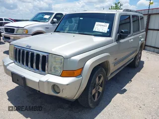 2007 Jeep Commander Sport z VIN 1J8HH48K47C699904, wystawiony jako IAAI lot #42509665 z przebiegiem 198 539 mil mil oraz . Historia ofert i sprzedaży dostępna na DreamBid. Obrazek 2.