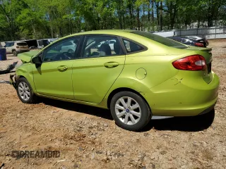 2012 Ford Fiesta SE z VIN 3FADP4BJ7CM164850, wystawiony jako Copart lot #51680925 z przebiegiem 184 884 mil mil oraz Szkoda całkowita • Salvage title. Historia ofert i sprzedaży dostępna na DreamBid. Obrazek 2.