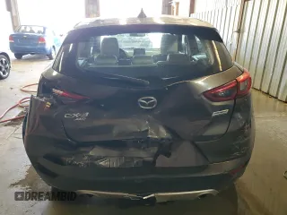 2016 Mazda CX-3 Grand Touring z VIN JM1DKFD74G0137815, wystawiony jako Copart lot #52405765 z przebiegiem 128 922 mil mil oraz Szkoda całkowita • Salvage title. Historia ofert i sprzedaży dostępna na DreamBid. Obrazek 6.