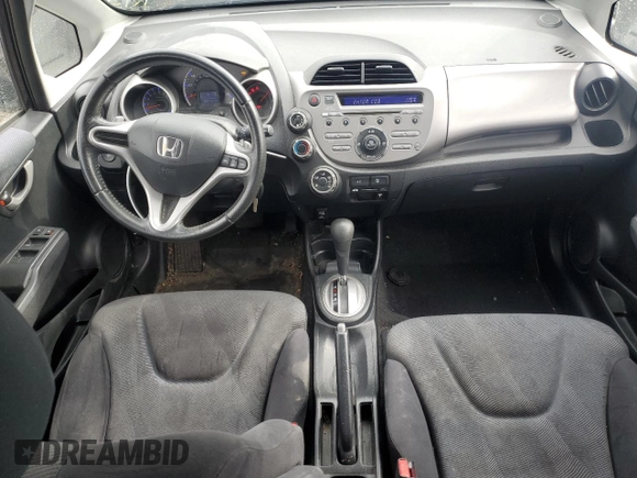 2009 Honda Fit Sport with VIN JHMGE88489S074126, listed as a Copart auction lot 74920054 with 100,157 mi miles and Salvage Title. Bid and sale history available at carsss.com. Image 8.