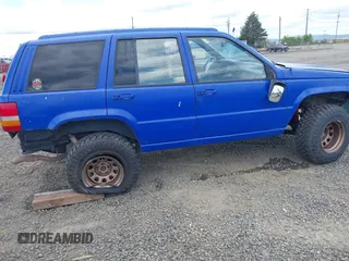 1996 Jeep Grand Cherokee Laredo with VIN 1J4GZ58YXTC329037, listed as a IAAI auction lot 42051175 with 314,571 mi miles and . Bid and sale history available at DreamBid. Image 6.