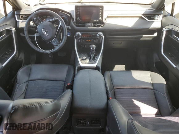 2021 Toyota RAV4 Hybrid XSE with VIN 2T3E6RFVXMW025145, listed as a Copart auction lot 51865655 with 201,591 mi miles and Salvage Title. Bid and sale history available at carsss.com. Image 8.