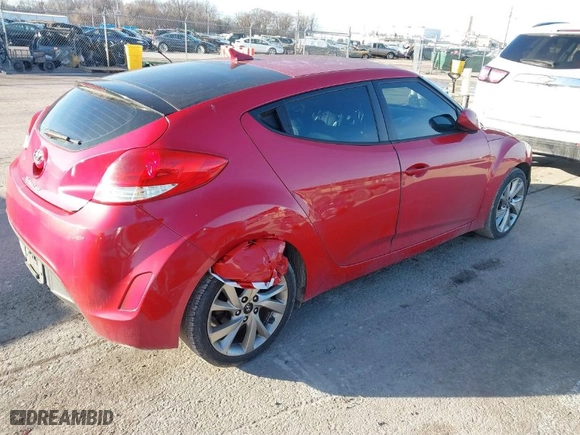 2016 Hyundai Veloster with VIN KMHTC6AD2GU272637, listed as a IAAI auction lot 41481226 with 143,974 mi miles. Bid and sale history available at carsss.com. Image 4.