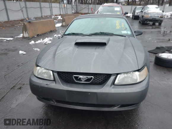 2004 Ford Mustang GT Deluxe z VIN 1FAFP45X74F128442, wystawiony jako IAAI lot #41580930 z przebiegiem 100 801 mil mil oraz . Historia ofert i sprzedaży dostępna na DreamBid. Obrazek 13.
