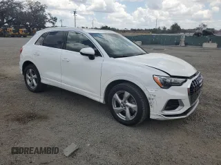 2020 Audi Q3 Premium with VIN WA1AECF32L1030604, listed as a Copart auction lot 57943755 with 61,261 mi miles and Non repairable. Bid and sale history available at DreamBid. Image 4.