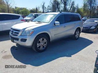 2009 Mercedes-Benz GL-Class 4.6L with VIN 4JGBF71E99A512434, listed as a IAAI auction lot 42074368 with 115,737 mi miles. Bid and sale history available at carsss.com. Image 2.