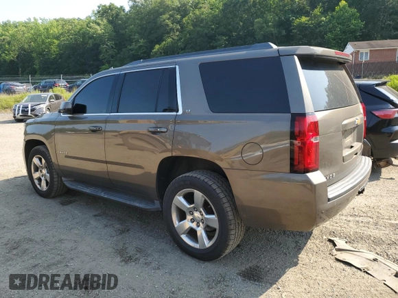 2016 Chevrolet Tahoe LT with VIN 1GNSCBKCXGR241872, listed as a Copart auction lot 59628315 with 156,862 mi miles and Salvage title. Bid and sale history available at DreamBid. Image 2.