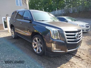 2015 Cadillac Escalade Premium with VIN 1GYS4CKJ2FR224440, listed as a IAAI auction lot 42558430 with 104,188 mi miles and . Bid and sale history available at DreamBid. Image 1.