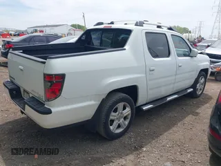2012 Honda Ridgeline RTL with VIN 5FPYK1F57CB453096, listed as a IAAI auction lot 42206169 with 82,846 mi miles and . Bid and sale history available at DreamBid. Image 4.