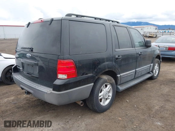 2005 Ford Expedition Special Service with VIN 1FMPU16515LA34140, listed as a IAAI auction lot 41836095 with 214,365 mi miles. Bid and sale history available at carsss.com. Image 4.
