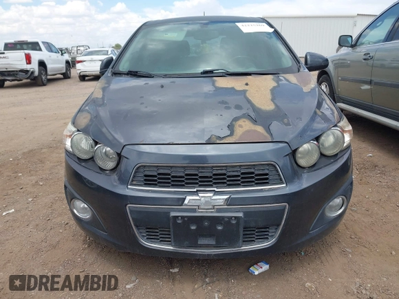 2015 Chevrolet Sonic LTZ z VIN 1G1JE6SB1F4202251, wystawiony jako IAAI lot #42225269 z przebiegiem 91 669 mil mil oraz . Historia ofert i sprzedaży dostępna na DreamBid. Obrazek 6.