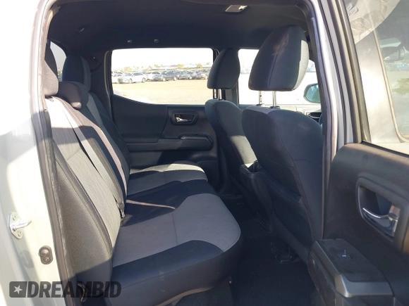 2022 Toyota Tacoma SR with VIN 3TMCZ5AN7NM501028, listed as a IAAI auction lot 42537868 with 42,186 mi miles and . Bid and sale history available at DreamBid. Image 8.