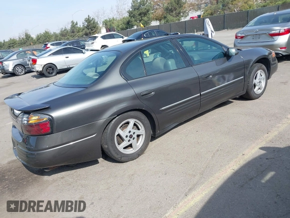 2003 Pontiac Bonneville SE z VIN 1G2HX52K934181238, wystawiony jako IAAI lot #41483636 z przebiegiem 176 737 mil mil oraz . Historia ofert i sprzedaży dostępna na DreamBid. Obrazek 4.