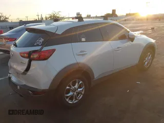 2018 Mazda CX-3 Sport with VIN JM1DKDB72J0305708, listed as a IAAI auction lot 40915983 with 65,324 mi miles. Bid and sale history available at carsss.com. Image 4.