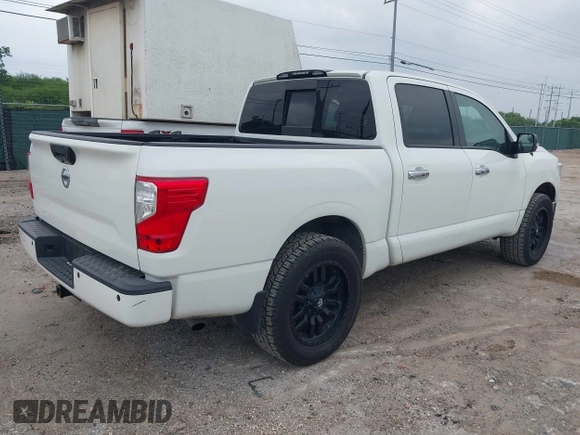 2018 Nissan Titan SV with VIN 1N6AA1E65JN506719, listed as a IAAI auction lot 42162605 with 81,255 mi miles. Bid and sale history available at carsss.com. Image 4.