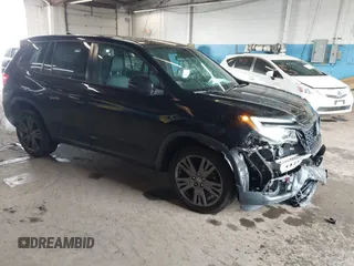 2020 Honda Passport EX-L z VIN 5FNYF8H5XLB005518, wystawiony jako IAAI lot #42021512 z przebiegiem 79 573 mil mil oraz . Historia ofert i sprzedaży dostępna na DreamBid. Obrazek 1.