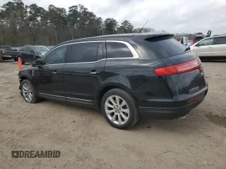 2014 Lincoln MKT with VIN 2LMHJ5FKXEBL53440, listed as a Copart auction lot 49063455 with 207,928 mi miles and Salvage Title. Bid and sale history available at DreamBid. Image 2.