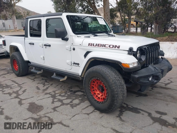 2021 Jeep Gladiator Willys with VIN 1C6HJTAG1ML572638, listed as a IAAI auction lot 42065562 with 43,040 mi miles and . Bid and sale history available at DreamBid. Image 1.